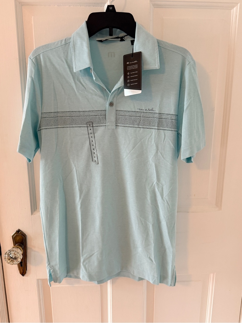 Travis Mathew Light Blue Men's Polo with Subtle Stripe Detail